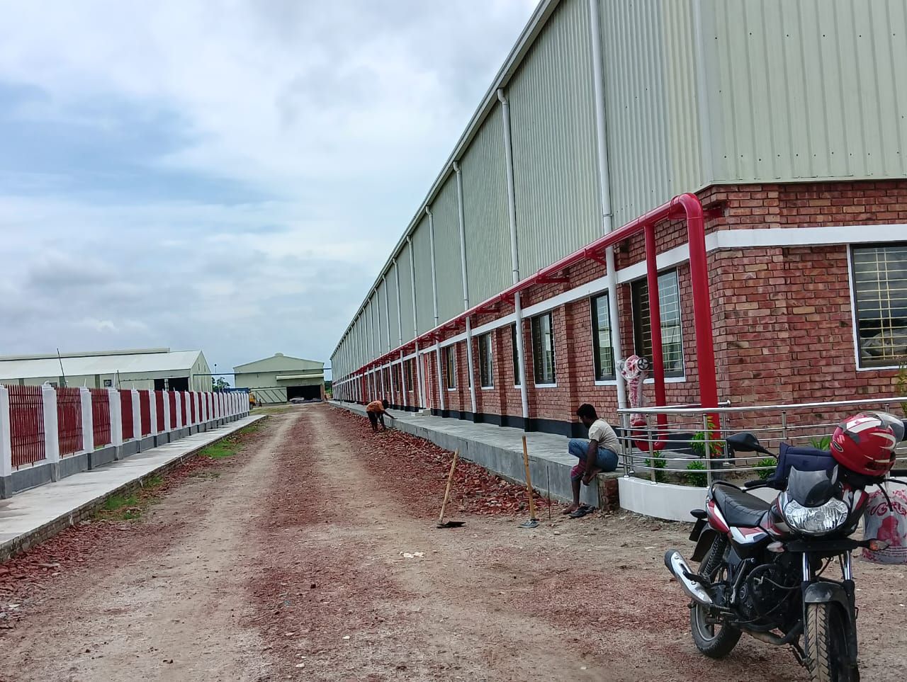 Fire protection pipework along Rajbari Jute Mill factory building